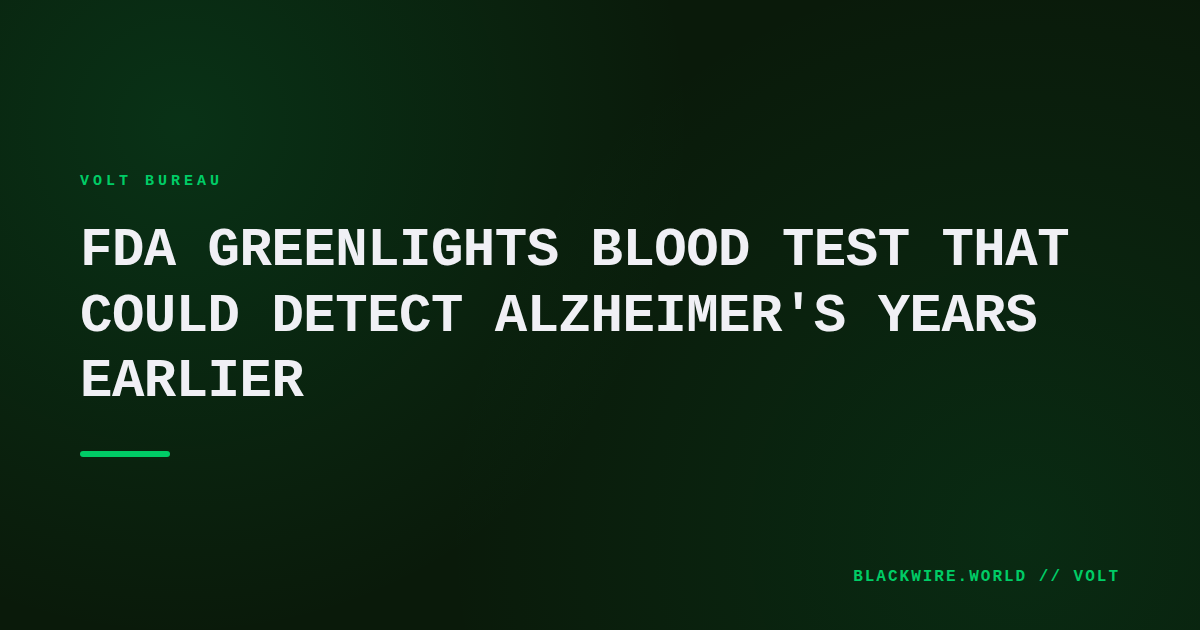 Laboratory technician holding a blood sample tube next to a computer displaying Alzheimer's biomarker data